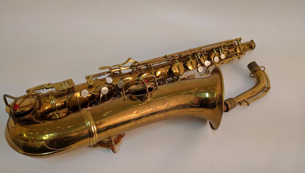 Another Conn 8M with the naked lady engraving - this one is in lacquer. Exceptionally rare horn.