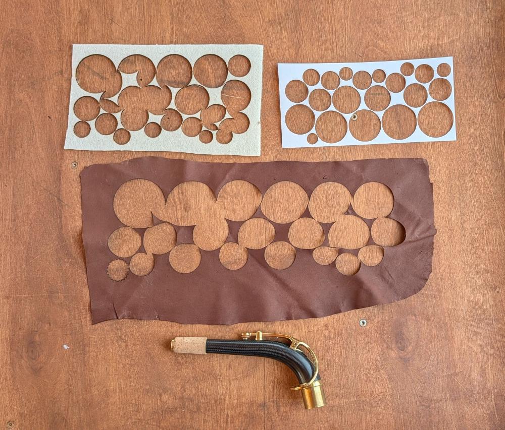 Pad set cutouts for a Super 20 alto - felt, card, leather.