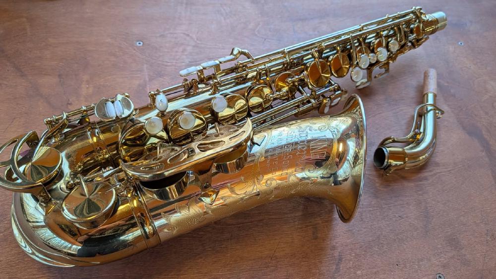 1951 King Super 20 'Silver Sonic' alto saxophone with full pearls.