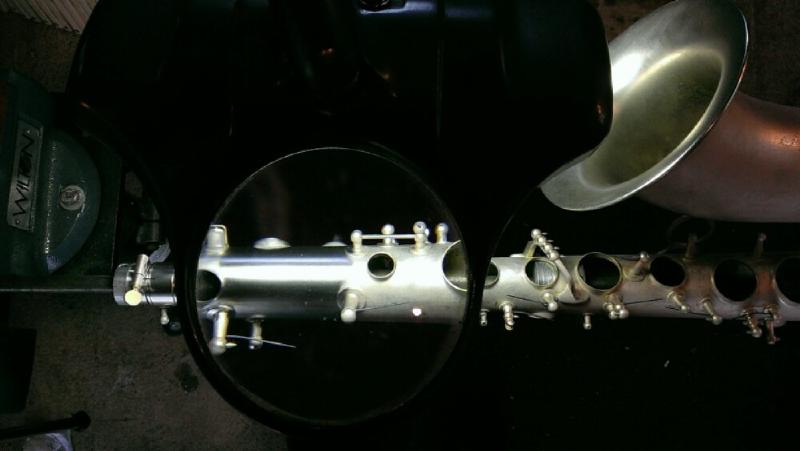 Horn body mounted on polishing fixture, mid polish.