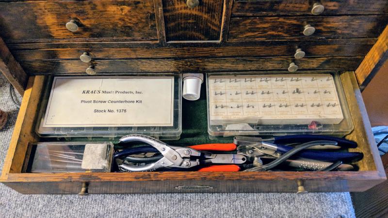 Exact shape pivot reamers, pivot screw counterbores, hinge tube facers, assorted swedging pliers and post fitting pliers, lapping compound.