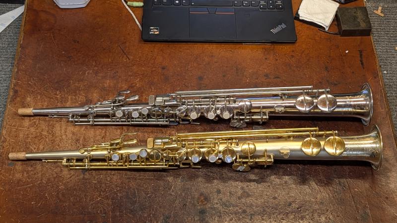Not one but TWO rare Conn 18M “stretch” sopranos, both in rare finishes! One in gold plate, one in nickel. I will let you decide which one is cooler.