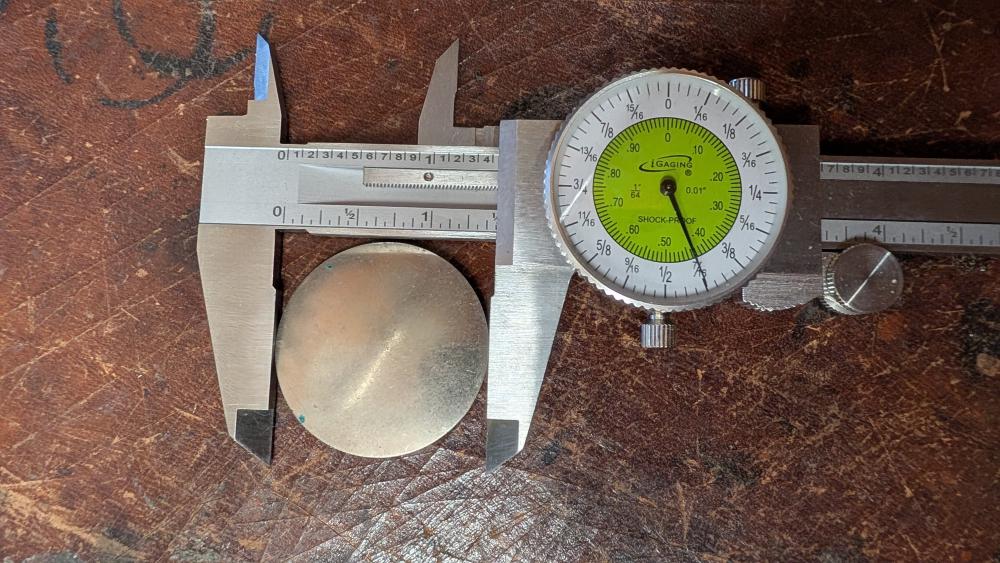 An original Selmer tone booster on a fractional dial caliper (you've got one of those, right?).