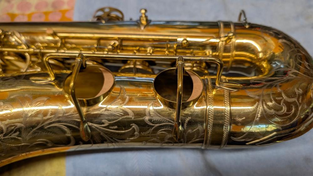 Crescents in the low B and low Bb toneholes of a Selmer Super tenor Crescents in the low B and low Bb toneholes of a Selmer Super tenor